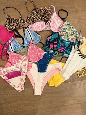 12 Size medium bikini tops and bottom